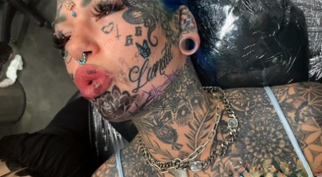 Tattoo enthusiast Amber Luke gets a new face tat from a female artist 75279614