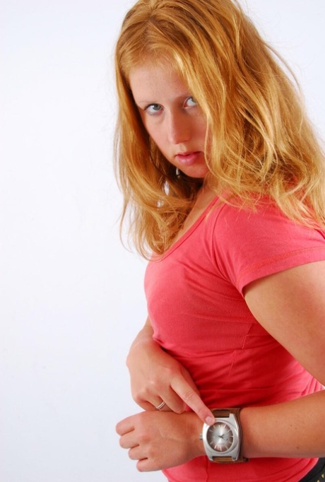 Natural redhead Judy displays her huge OOZOO cuff watch while fully clothed 18377411
