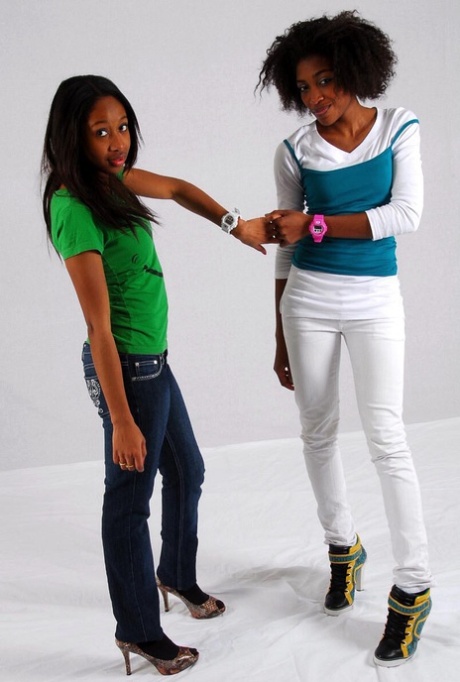 Lesbian sistas Deborah and Naomie model A Bathing Ape watches while clothed 97916714