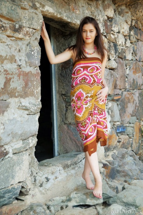 Sweet teen Kacy Lane gets totally naked at a stone faced building 72941456
