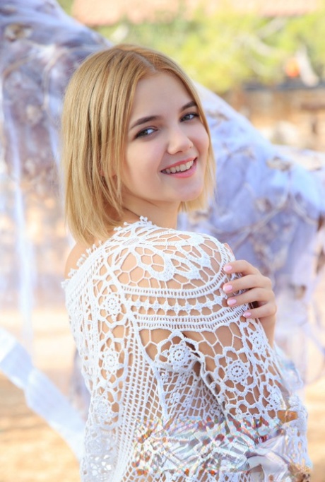 Sweet blonde teen Chanel Fenn gets bare naked on a picnic table 18246903