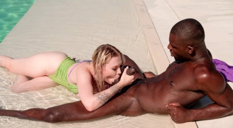 Blonde chick Mimi Cica has hardcore interracial sex beside a swimming pool 79439610