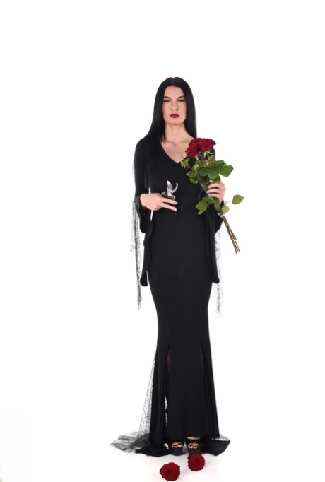 Gorgeous brunette Kitty unzips from a long black gown before toying her cunt 18541347