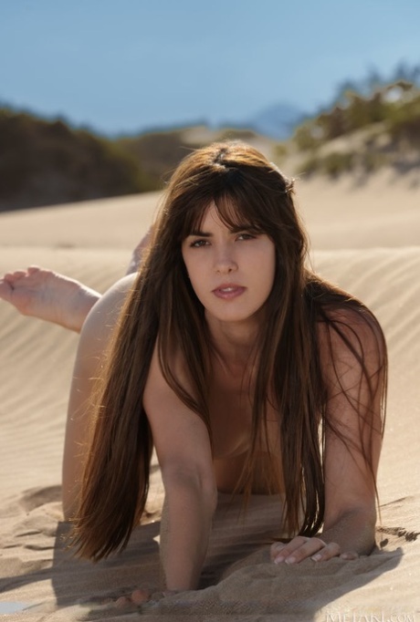 Sweet teen Leni Doll gets completely naked upon sandy terrain 44027571