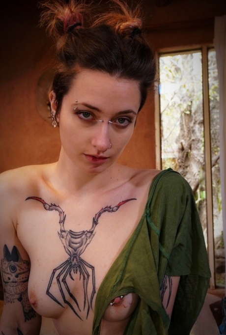 Tattooed chick Alena finger spreads her pink pussy during a solo show 44824094