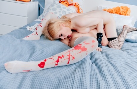 Cute teens end up in a 69 position during lesbian sex at Halloween 77347526