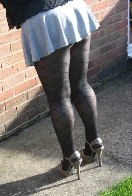 Older UK fatty Kinky Carol strips to lingerie and pantyhose outside her house 64520910