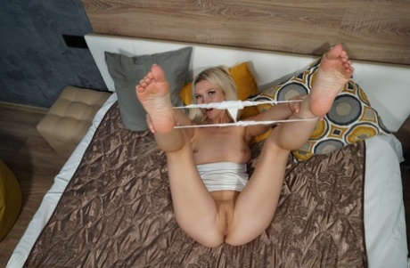 Hot blonde Jessika Blond masturbates with a vibrator on her bed 45166993