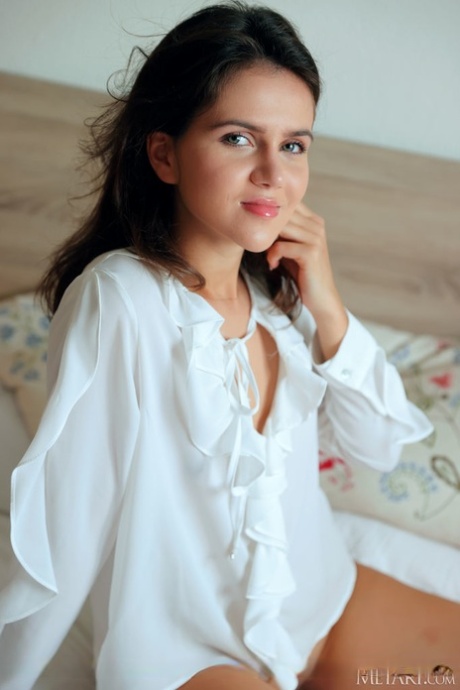 Beautiful brunette teen Vanessa Shy gets completely naked on her bed 97736457