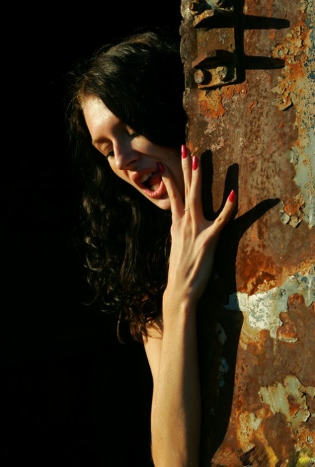 18-year-old brunette Voleta F strikes great nude poses during outdoor action 85971089