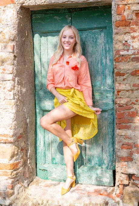 Beautiful blonde teen Bella Spark gets totally naked in a sunny locale 75242349