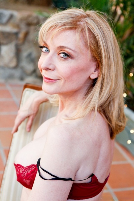 Mature woman Nina Hartley and her lesbian lover Sara Stone model in lingerie 12115806