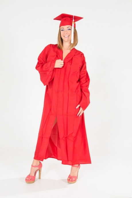 Solo model Sierra Sanders dons a mortar board and gown after stripping naked 91282666