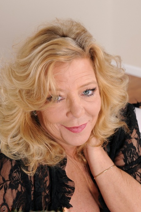 Older BBW Karen Summer exposes tits and twat in black stockings 63564272
