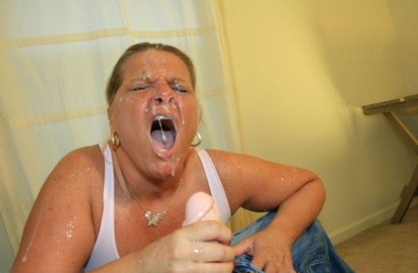 Mature woman Mrs Robonson jerks on a dick until it blows jizz on her face 10748893