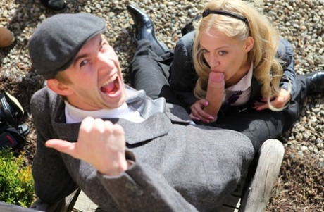 Blonde schoolgirl Loulou sucks a huge cock during closeup action outdoors 14665550