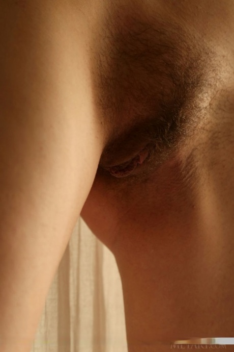 Skinny brunette teen Liania simply loves spreading her hairy pussy 27164719