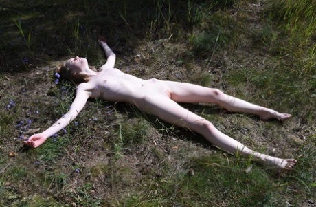 Long legged teen Gerda gets bare naked while in the woods 27424599