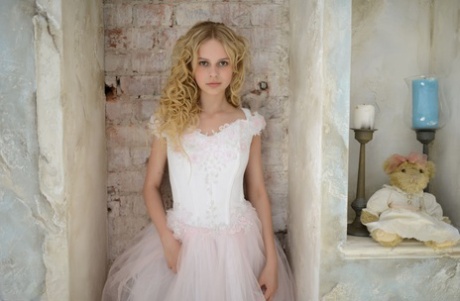 Young blonde Nika kicks off her panties after removing her wedding dress 86601597