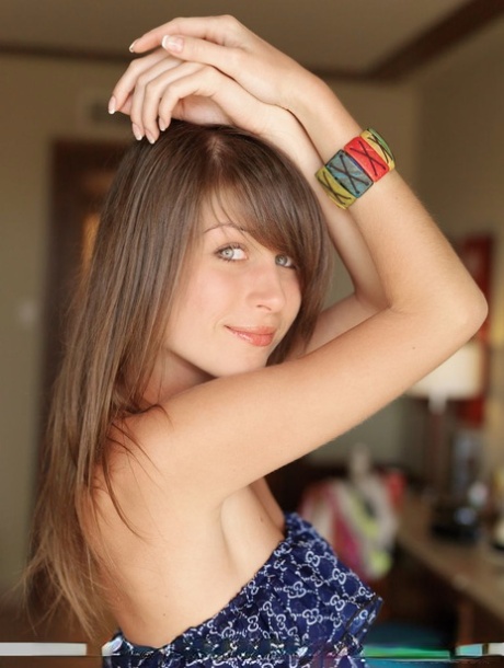 Adorable teen Mia D spreads her long legs to showcase her shaved pussy 77503586