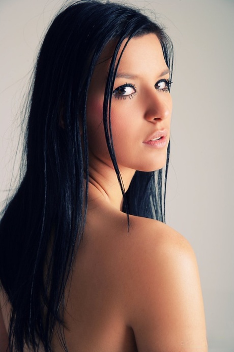 Dark haired girl Katie showcases her nice pussy while naked in heels 66837611