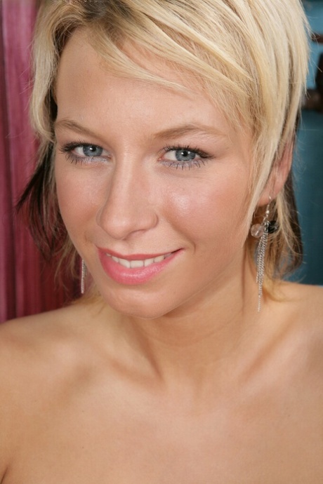 Nude blonde amateur with ample bosoms fingering her pink honey pot 61302246