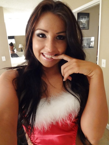 Playful brunette doxy in Christmas outfit uncovering her sexy body 12221081