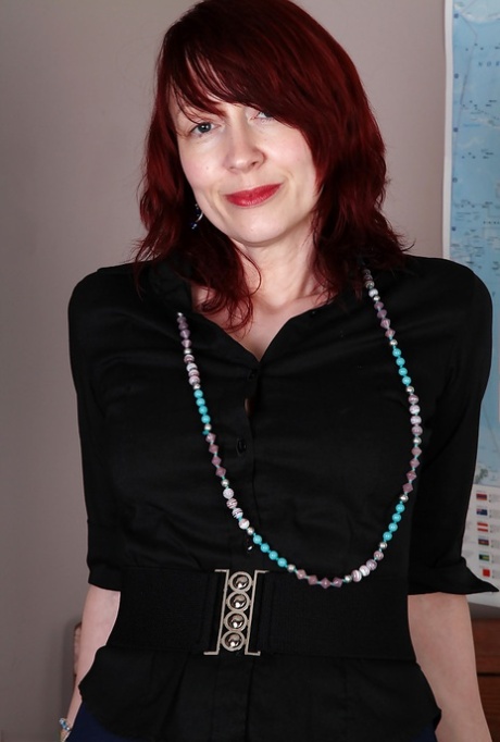 Redhead mature teacher undressing and exposing her goods in the classroom 59917812
