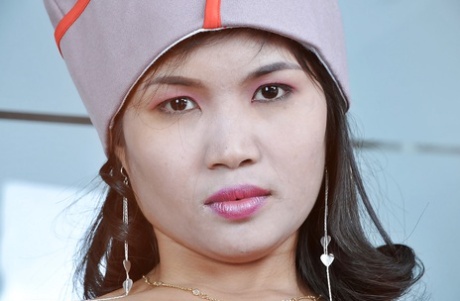 Asian military lady pulls down camouflage panties to spread pink pussy lips 84776448
