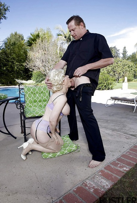 Busty older pornstar Nina Hartley giving preacher a blowjob outdoors 48761495