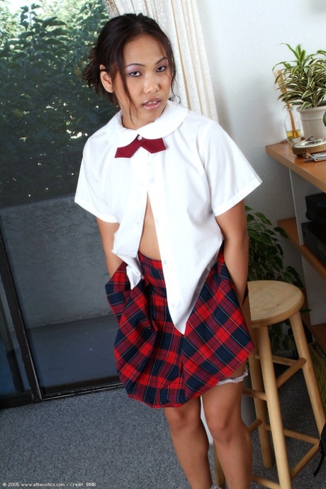 Amateur Asian babe flashing small teen schoolgirl breasts and underwear 98354717
