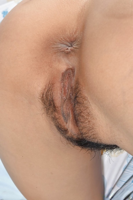 Petite Asian amateur Saya Song stretching neatly trimmed pussy on bed 62995962