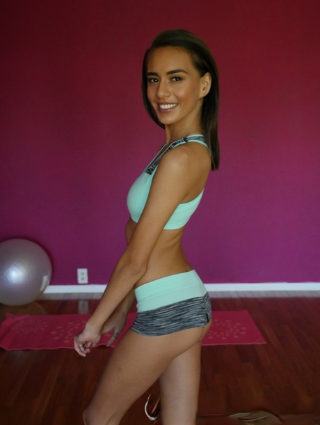 Petite teen girl Janice Griffith bares her tits before pulling down her undies 17928258