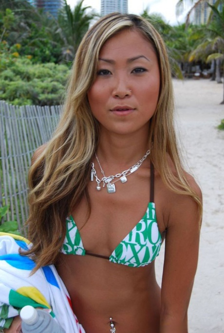 Asian teen babe with tiny tits Tina posing in hot bikini outdoor 37558966