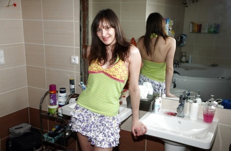 Horny babe in mini skirt Paige D stripping and masturbating her slit 68032484