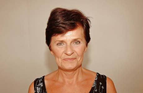Short haired granny in stockings stripping off her dress and lingerie 18860781