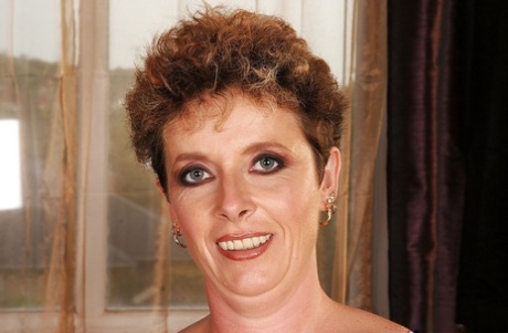 Lusty granny with big flabby jugs stripping and spreading her legs 25431948