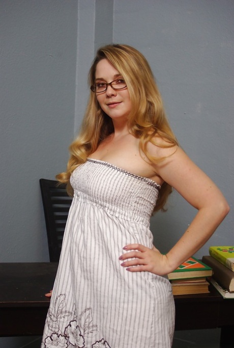 Chubby blonde in glasses slowly uncovering her fuckable body 14886106