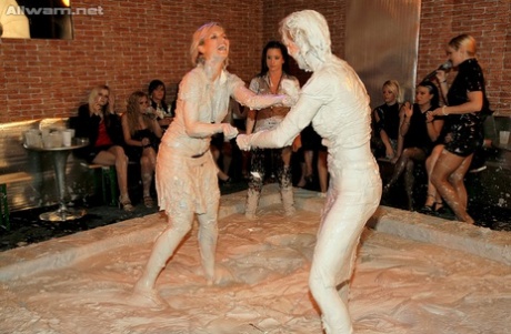 Kinky fetish ladies make some fully clothed mud wrestling action 13072385